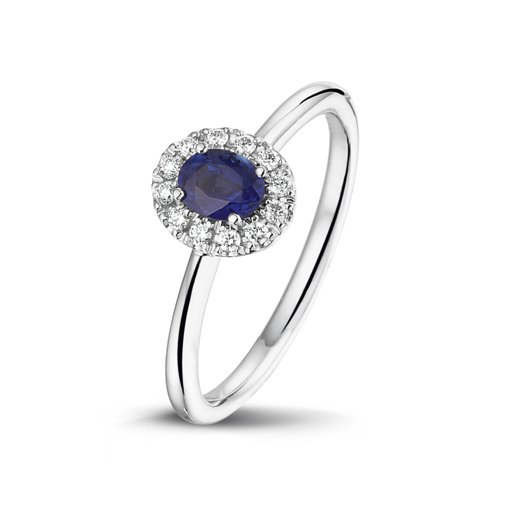 White golden ring with blue sapphire and diamonds