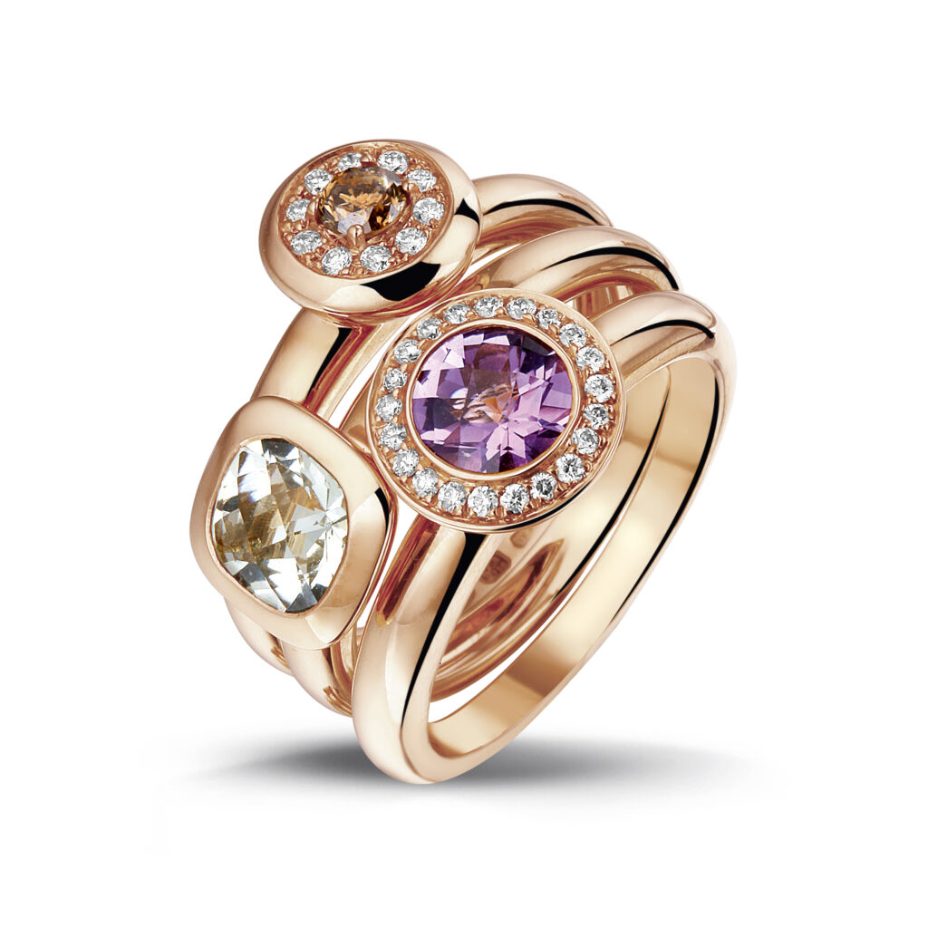 Rosé gold stackable rings with gemstones and diamonds