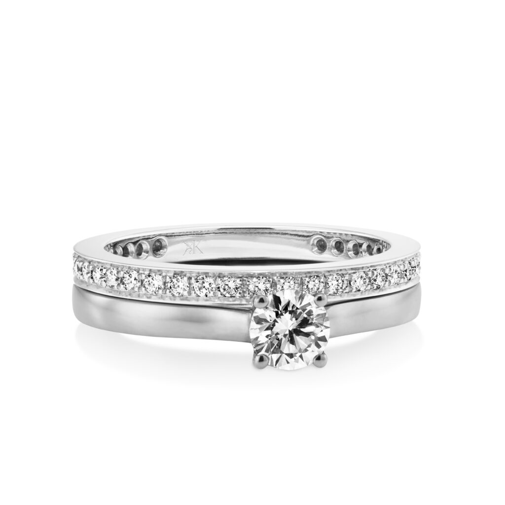 White golden solitaire ring with diamonds
