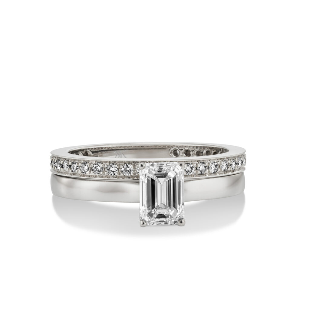 White golden ring with emerald cut diamond