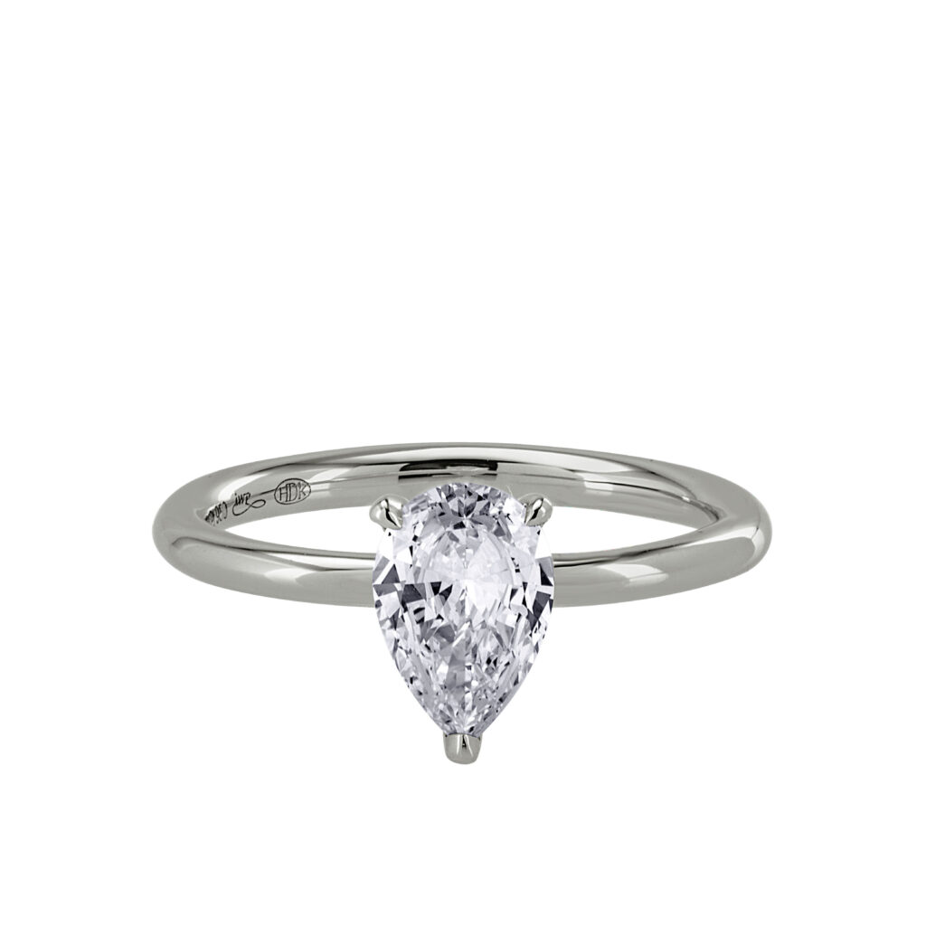 White golden ring with pear shaped diamond