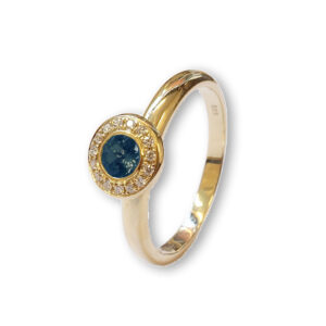 Rosé golden ring with London Blue topaz and diamonds