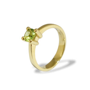 Yellow golden ring with peridot