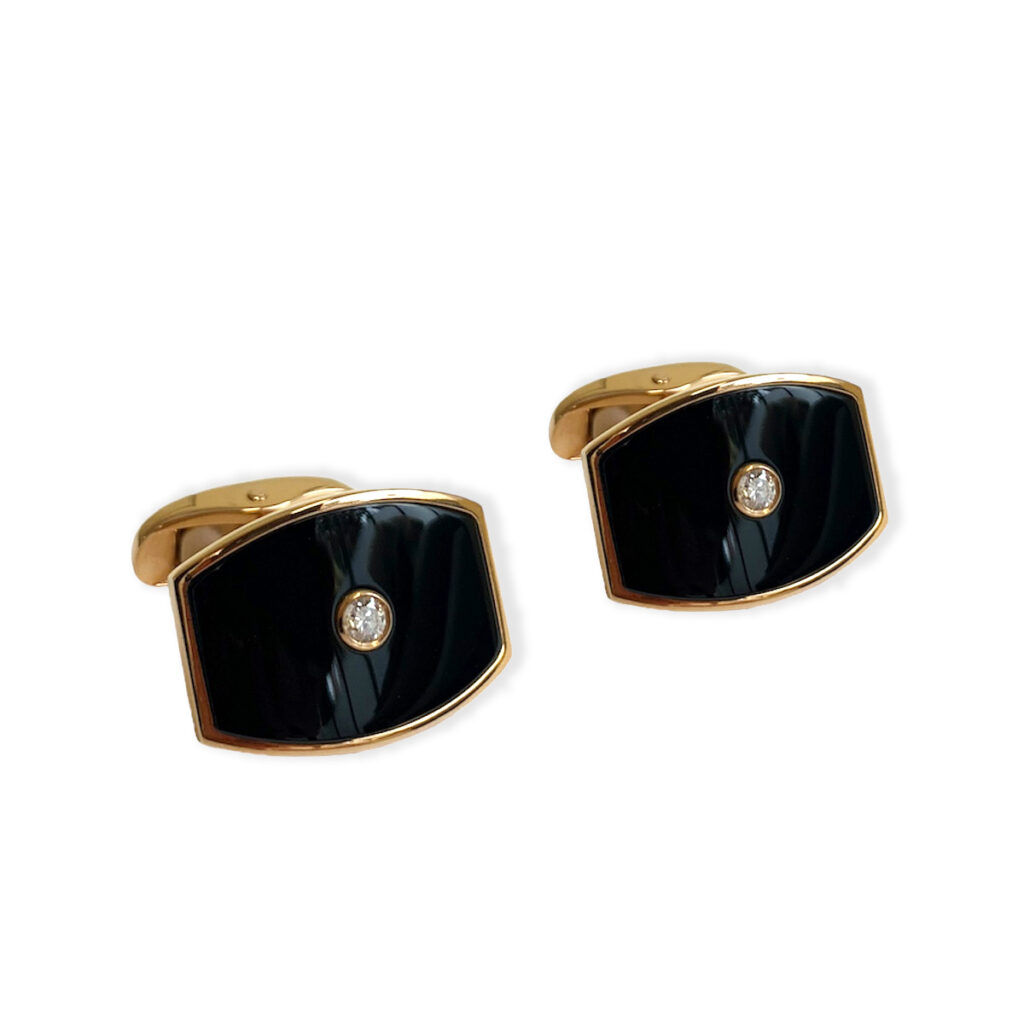 Golden cufflinks with enamel and diamond