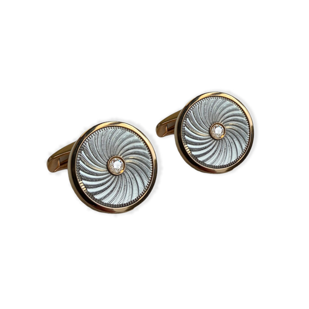 Bicolor cufflinks with diamond