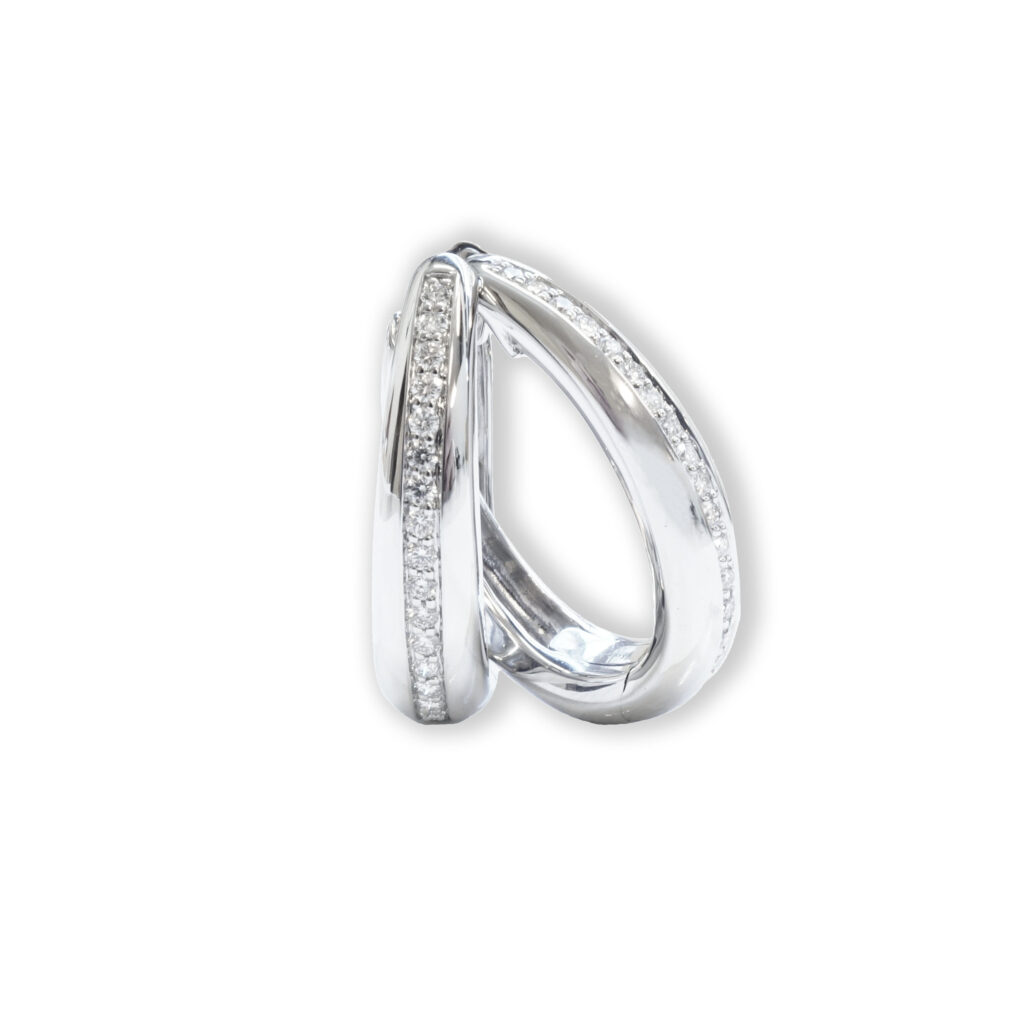 Drop shaped, white golden earrings with diamonds