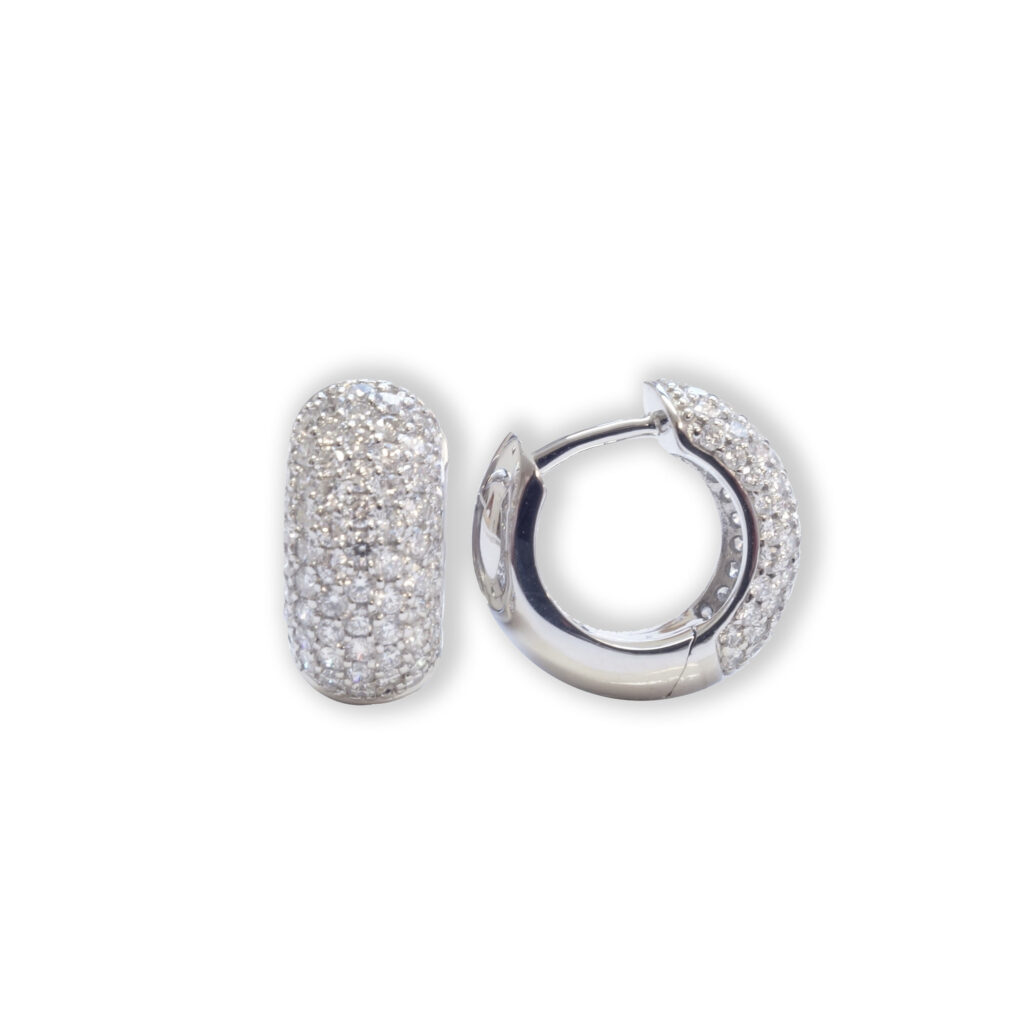White golden earrings with diamonds, pavé