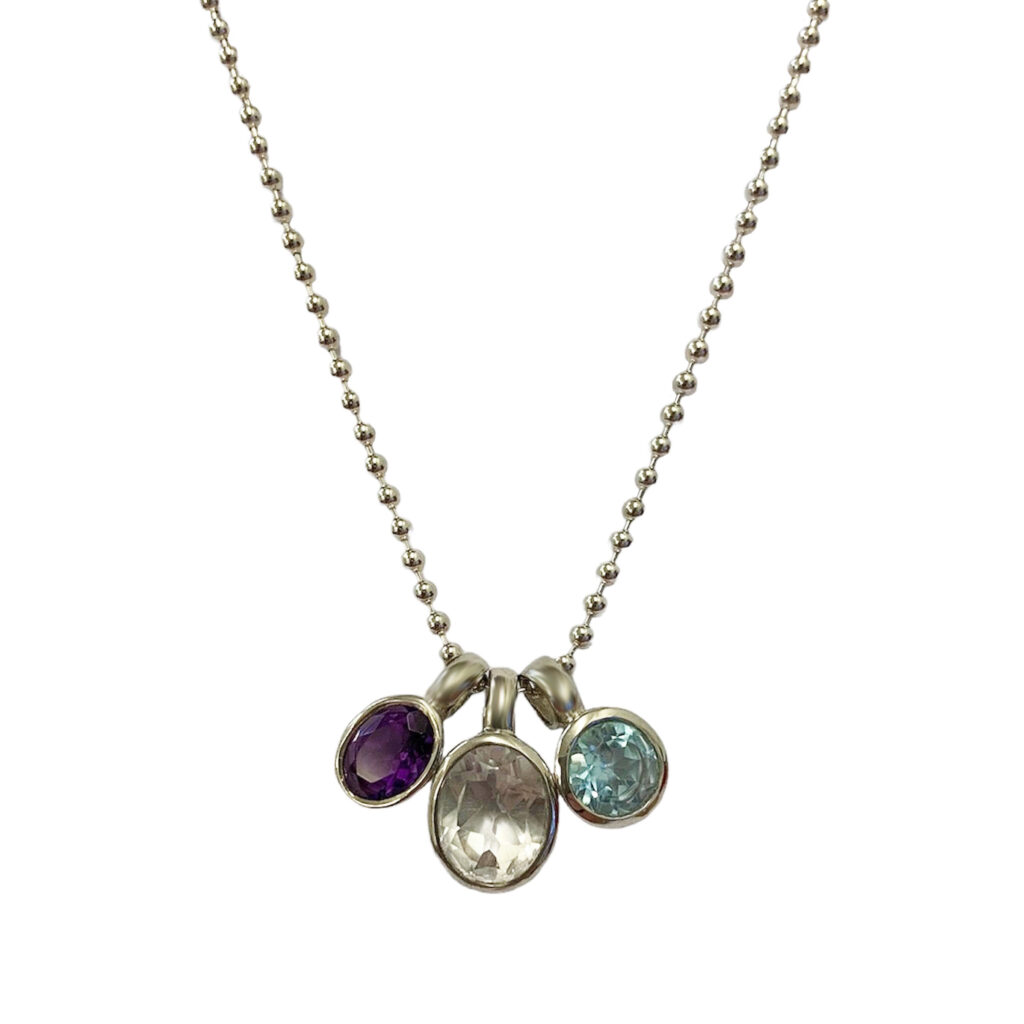 Silver necklace with gemstone pendants