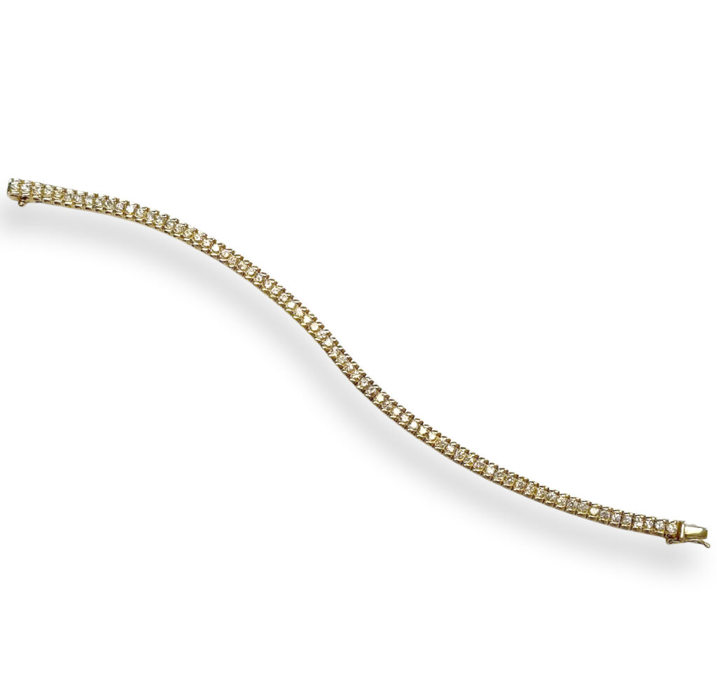 Yellow golden bracelet with zirkonia