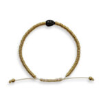 Yellow golden bracelet with black spinel