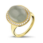 Yellow golden ring with diamonds and aquamarine