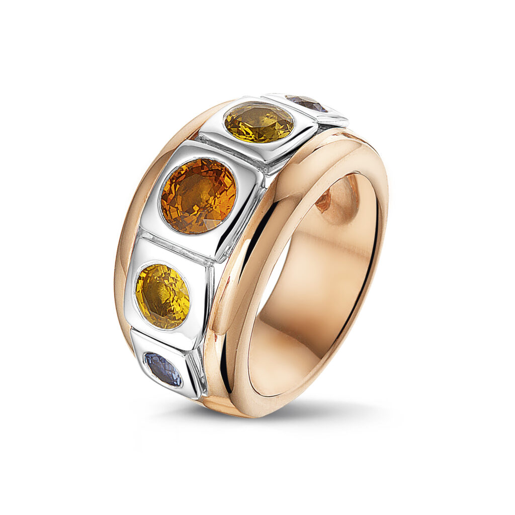 Bicolor ring with blue, orange and yellow sapphires