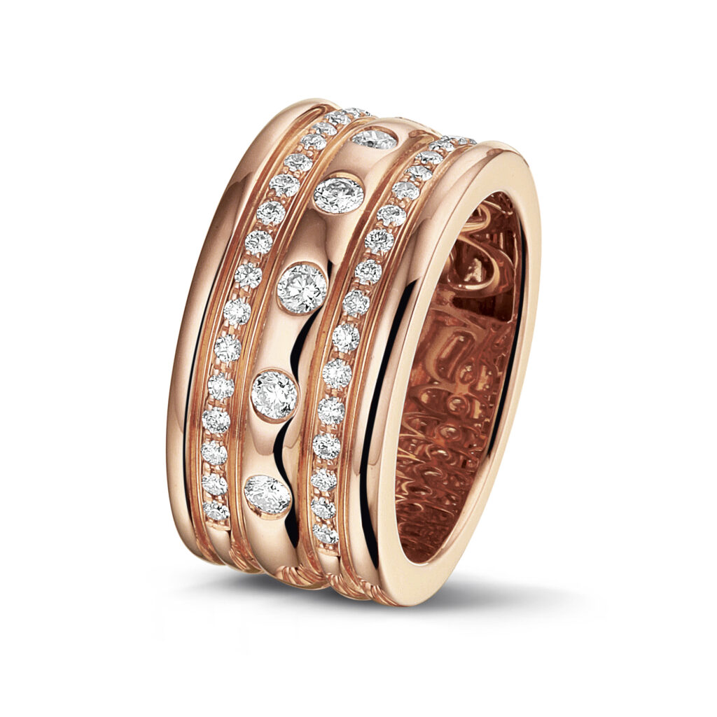 Rosé golden statement ring with diamonds