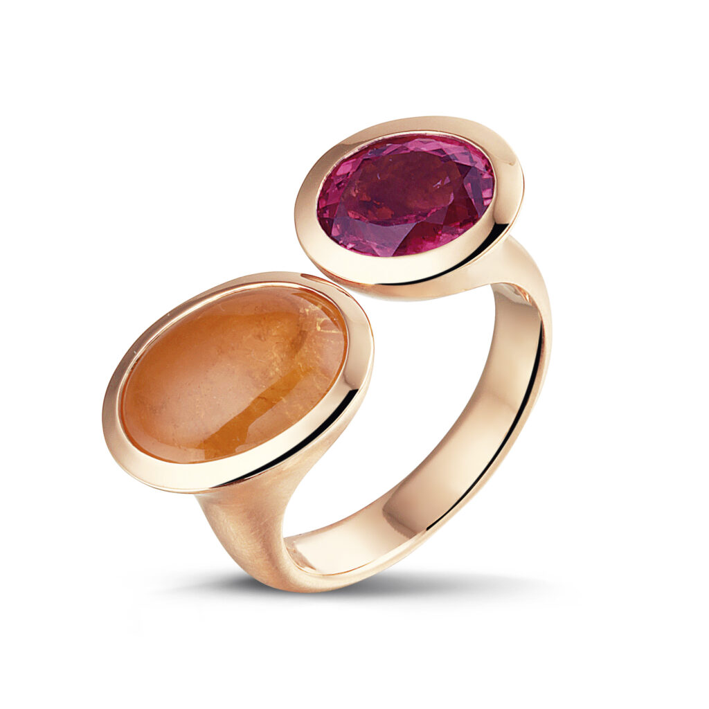 Rose golden ring with mandarin grenade and hessonite