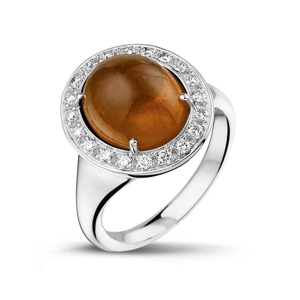 White golden ring with mandarin grenade and diamonds