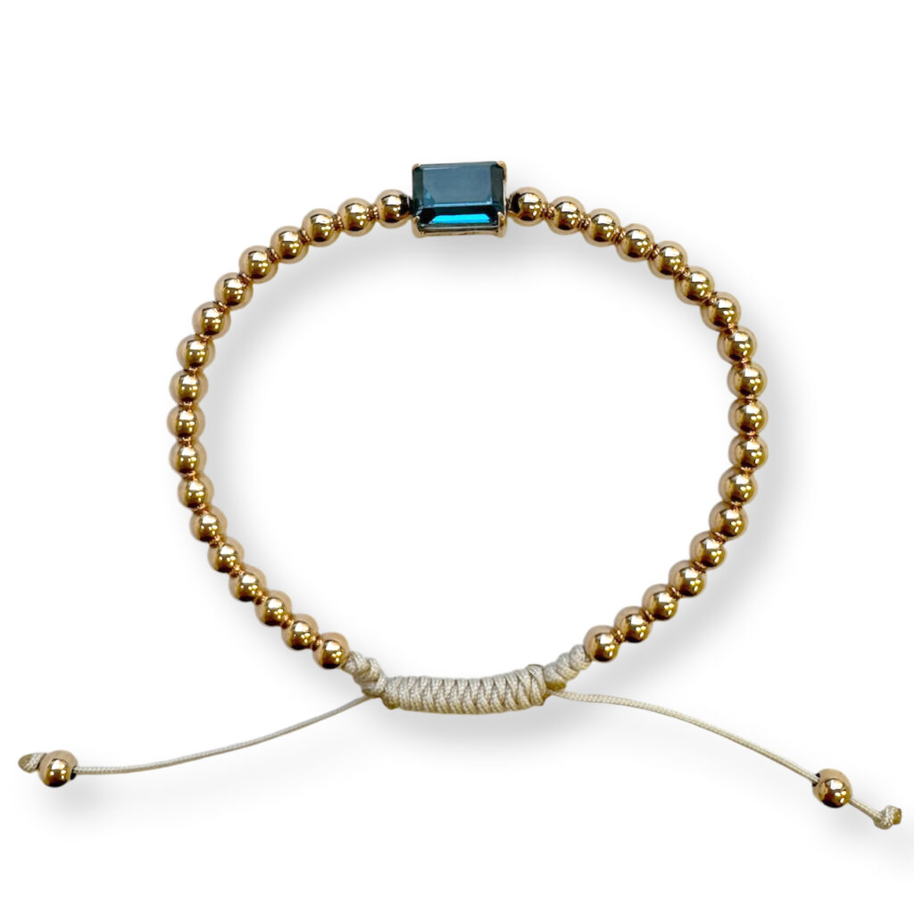 rose golden bracelet with london blue topaz